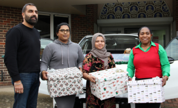 Deputy Leader and Council staff with hampers outside