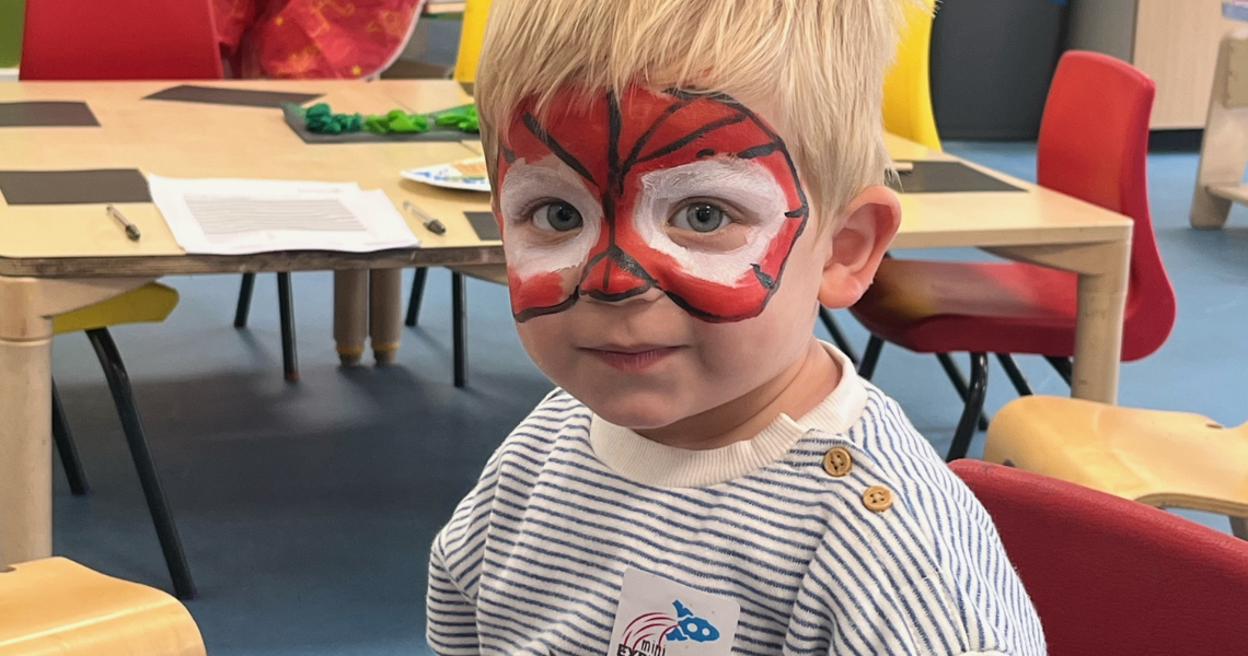 Young boy with face paint