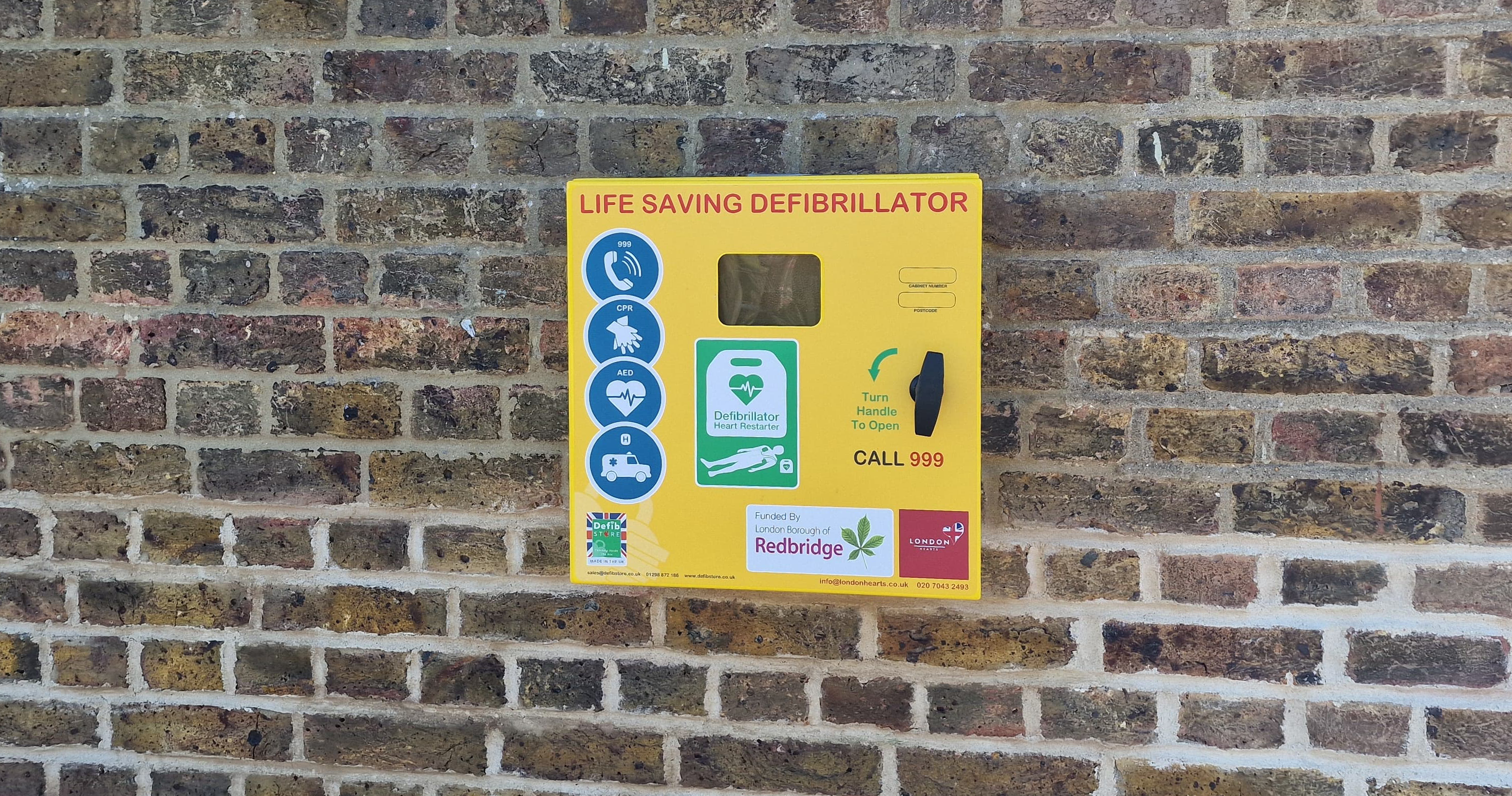 defibrillator on a wall